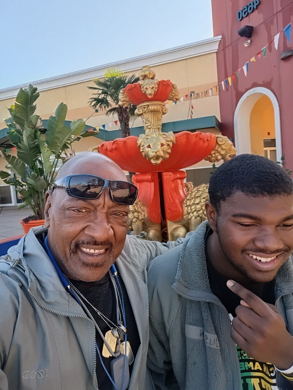 Tyrone and Justin sharing a joyful moment